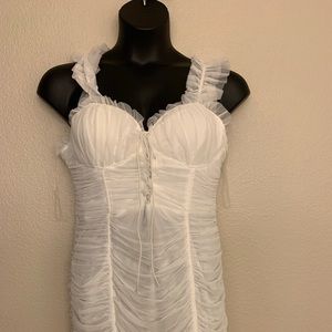 Fashion Nova: “Ruff Around The Edges Ruched Dress”